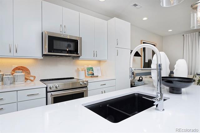 3141 W Bates Avenue Denver CO 80236 | MLS #8411433 Image 1